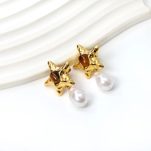 Golden starfish drop earrings with brown cat eye stone and white pearl pendant