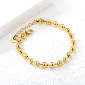 Polished 18k gold plated stainless steel beaded chain bracelet with lobster clasp