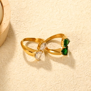 Adjustable 18K gold plated ring featuring two heart-shaped emerald and zircon stones