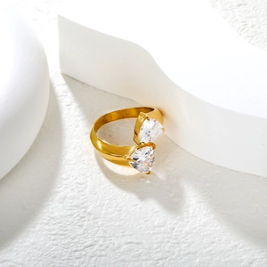 18K gold plated open ring featuring two triangle emerald-cut crystals in a 3-prong setting