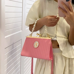 Pink vintage evening bag with pearl handle and cameo badge decoration for women
