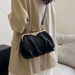 Fashionable black pleated shell bag with gold floral kiss-lock and PU leather strap