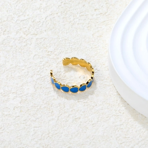 Bague ajustable en acier doré 18 carats avec cœurs en émail bleu