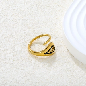 Detail of 18K gold plated hollow teardrop ring with blue gemstone pavé setting