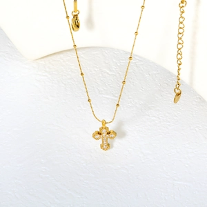 Minimalist gold stainless steel cross necklace with sparkling zircon pavé on bead chain