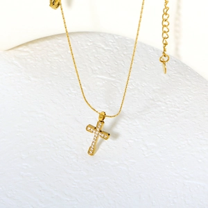 Minimalist gold stainless steel cross necklace with sparkling zircon pavé for women