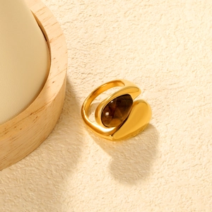 Asymmetric 18K gold-plated stainless steel ring with a large oval tiger eye stone