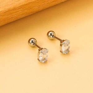 Detail of oval white cubic zirconia stud earrings with stainless steel screw ball back