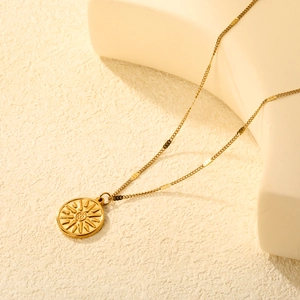 18K gold plated stainless steel sun pendant necklace with minimalist sunburst disc design