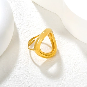 Minimalist 18K gold-plated irregular hollow waterdrop open ring on a stone base