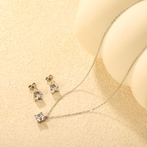 Elegant silver jewelry set with four-claw round zircon pendant necklace and stud earrings