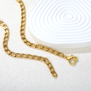 18k gold heart clasp necklace featuring a thick flat link chain for modern women