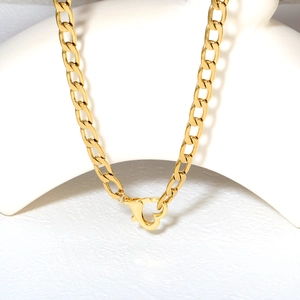 Polished gold Cuban link chain necklace with a decorative heart-shaped OT toggle clasp
