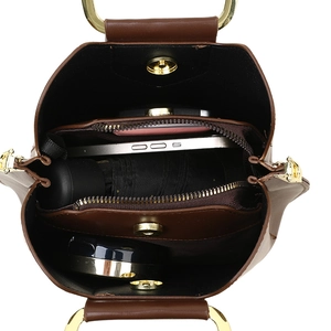 Brown leather bucket bag with multi-layer interior storage and golden chain handle