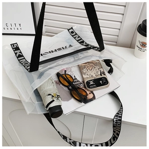 Top view of transparent PVC tote bag with large capacity for umbrella and sunglasses