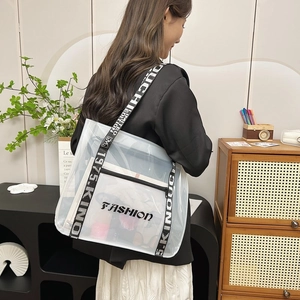 Transparent PVC tote bag with stylish jacquard strap and internal black pouch for women