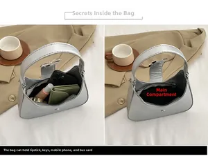 Internal view of silver bow handbag showing capacity for phone, wallet and lipstick