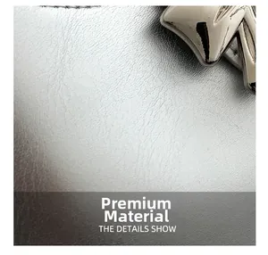 Macro detail of high-quality silver metallic leather texture and elegant bow buckle