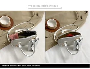Detailed interior of crocodile pattern shell bag showing storage for daily essentials