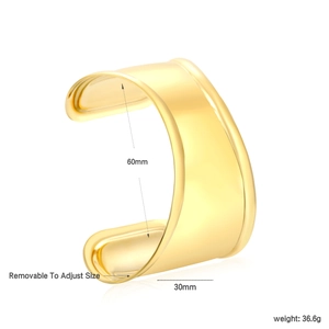 Bracelet manchette large doré poli avec dimensions de 60 mm de diamètre et 30 mm
