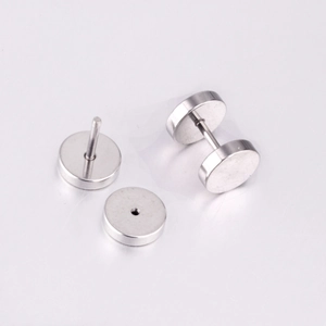 Detail view of round stainless steel screw back stud earrings with flat disc design