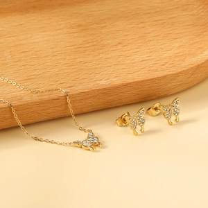 Parure bijoux papillon dorée avec collier et boucles d'oreilles ornés de cristaux brillants