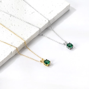 Elegant gold and silver necklaces with round emerald green gemstone pendant jewelry