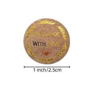 Brown kraft paper stickers featuring Handmade With Love gold foil text and heart design