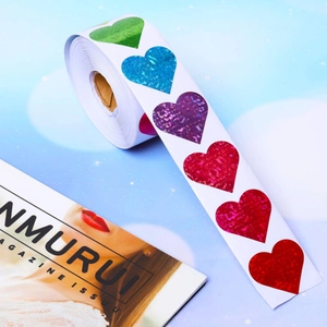 Holographic colorful heart stickers in a roll for Valentine gift wrapping and DIY crafts