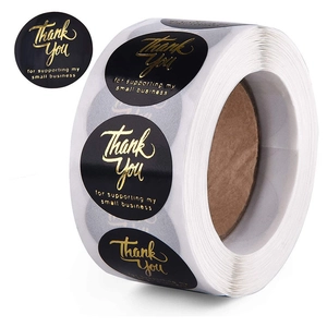 Roll of black matte round stickers with gold foil Thank You for Your Order calligraphy