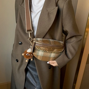 Retro plaid crossbody chest bag for women with gold chain detail and plush pendant charm