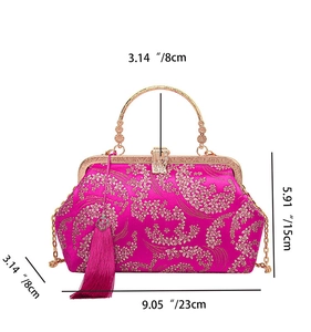 Detailed view of rose pink silk handbag with gold floral embroidery and size dimensions