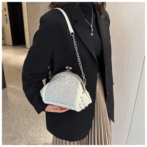 Luxurious white rhinestone seashell clutch with metal chain strap and spherical rivet accents