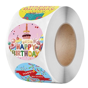 Rolle mit bunten Happy Birthday Aufklebern mit Tortenmotiven für Geschenke und Partys