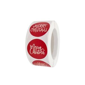 Roll of red Merry Christmas decorative round paper gift stickers with white festive star patterns
