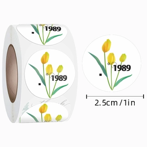 Roll of 1-inch white round stickers with yellow tulip flower and 1989 text print