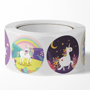 Roll of colorful unicorn rainbow stickers with self-adhesive labels for gift packaging