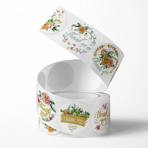 Pink floral Thank You stickers roll for gift packaging with assorted flower patterns