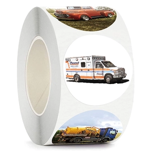 Roll of colorful cartoon vehicle stickers including red trucks and white ambulances