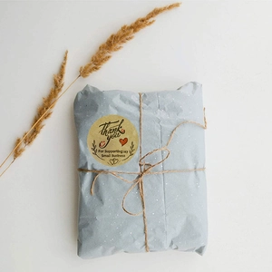 Kraft Thank You sticker set with olive branch and baker twine on blue dotted paper