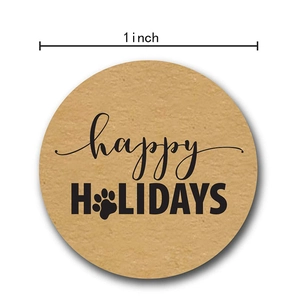 1 inch Kraft Happy Holidays round stickers featuring a cute animal paw print design