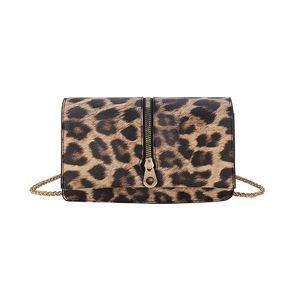 Minimalist leopard print crossbody bag with gold chain strap and decorative zipper detail