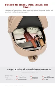 Detail view of large capacity beige backpack with multiple compartments for electronics