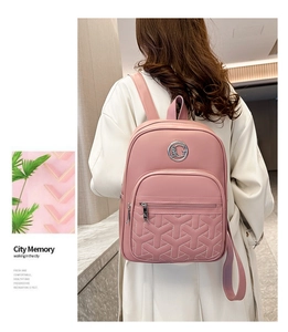 Pink PU leather backpack with geometric Y-shaped quilting and silver logo detail