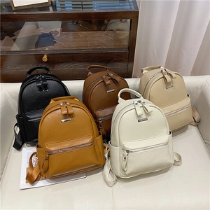 Minimalist soft leather backpacks for women in five colors with lychee texture details