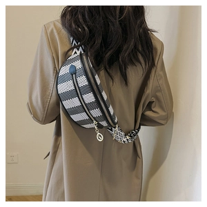 Detailed back view of a black and white geometric pattern crossbody chest bag for women