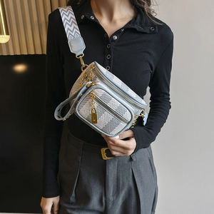 Light blue geometric patterned crossbody chest bag with adjustable wide fabric strap