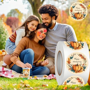 Roll of Happy Thanksgiving pumpkin stickers with autumn leaves for gift packaging decor