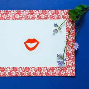 Self-adhesive round white seal sticker with red lips pattern on floral display card