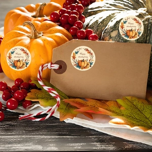 Adhesive Happy Thanksgiving stickers featuring pumpkins and maple leaves for gift sealing